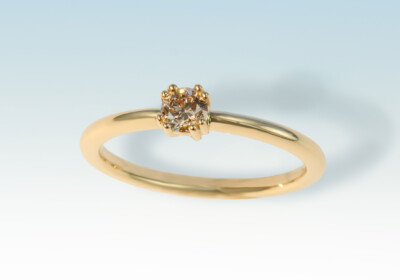 Ring solitaer gg 4 griff diam braun